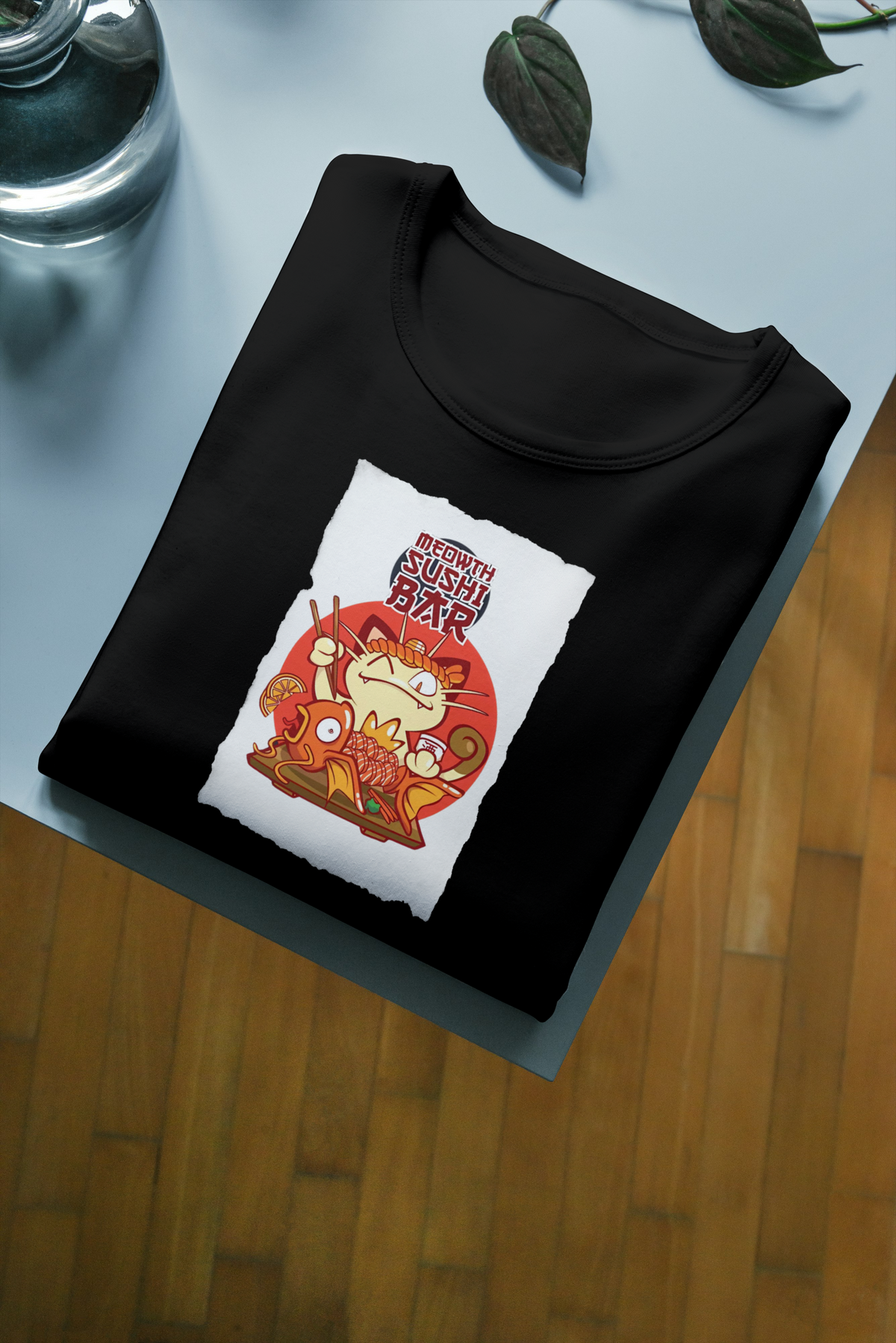 Meowth Pokémon black T-shirt front flatlay